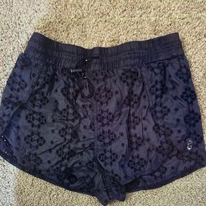 Free people movement eyelet navy shorts